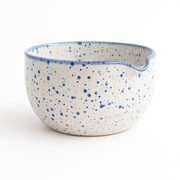 Handcrafted ceramic matcha bowl by MugMug for Thea9, featuring artisanal blue speckle design and a pouring spout for effortless ceremony-grade tea preparation.